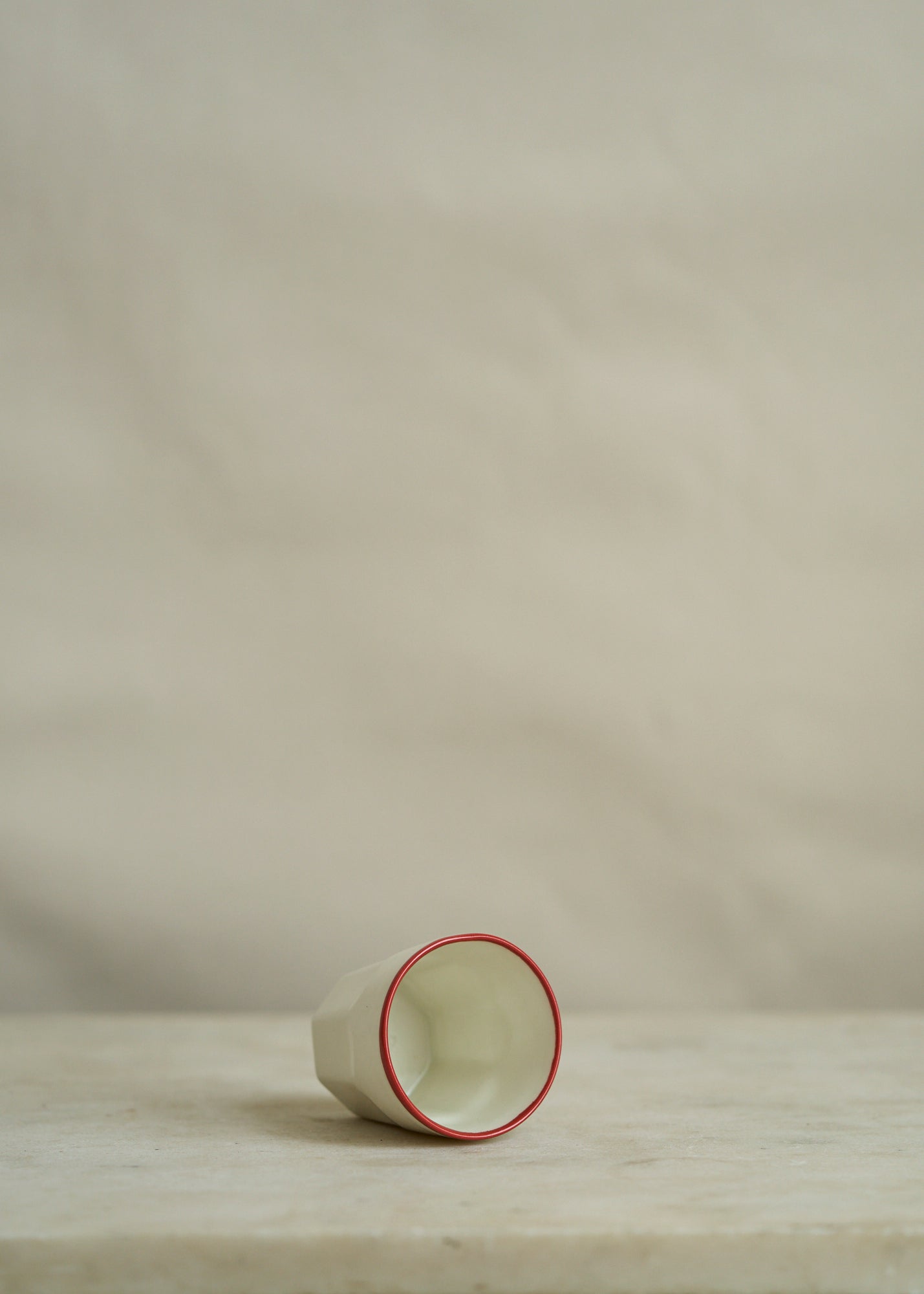 Porcelain Drinking Mug with Red Rim