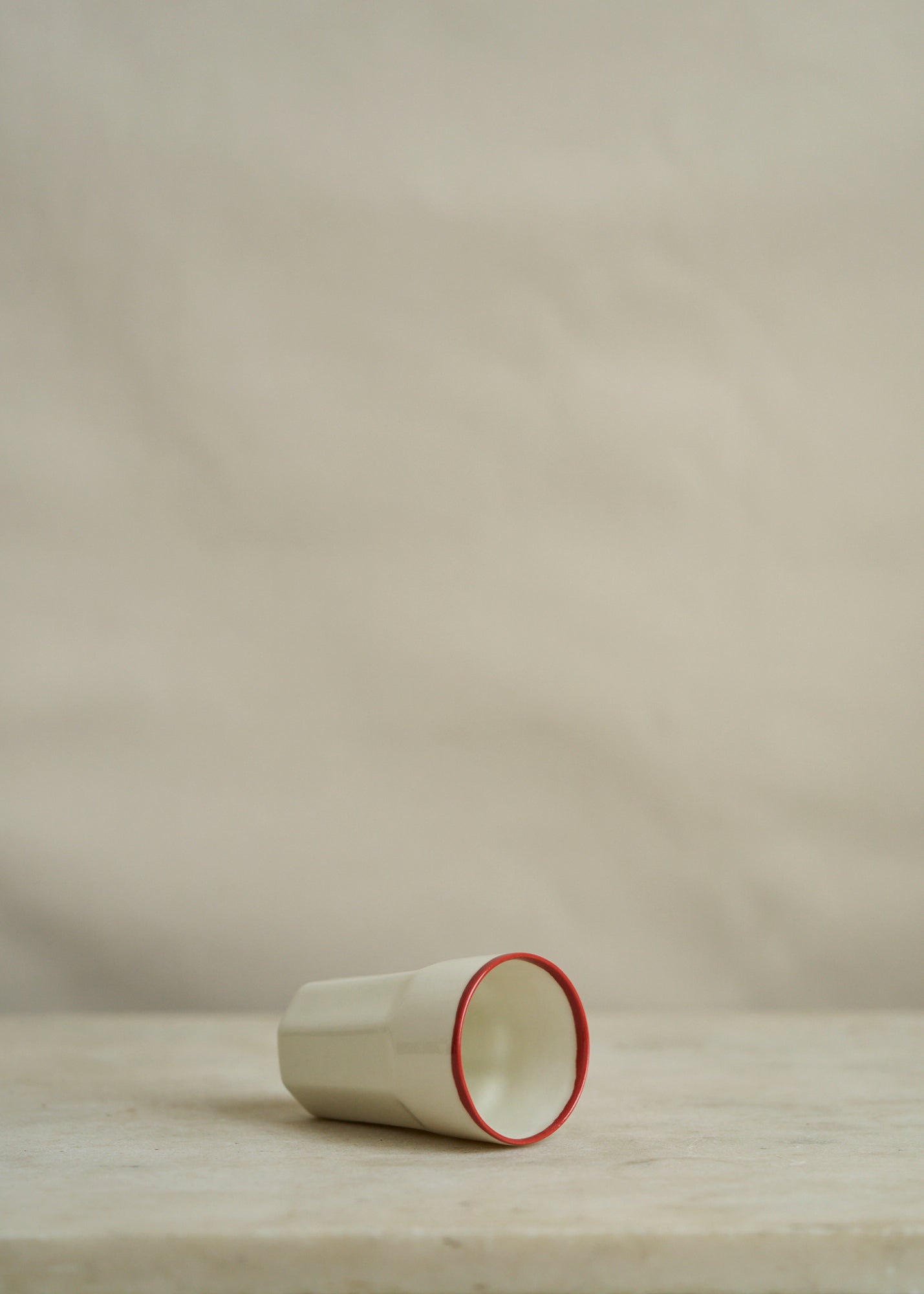 Porcelain Drinking Mug with Red Rim