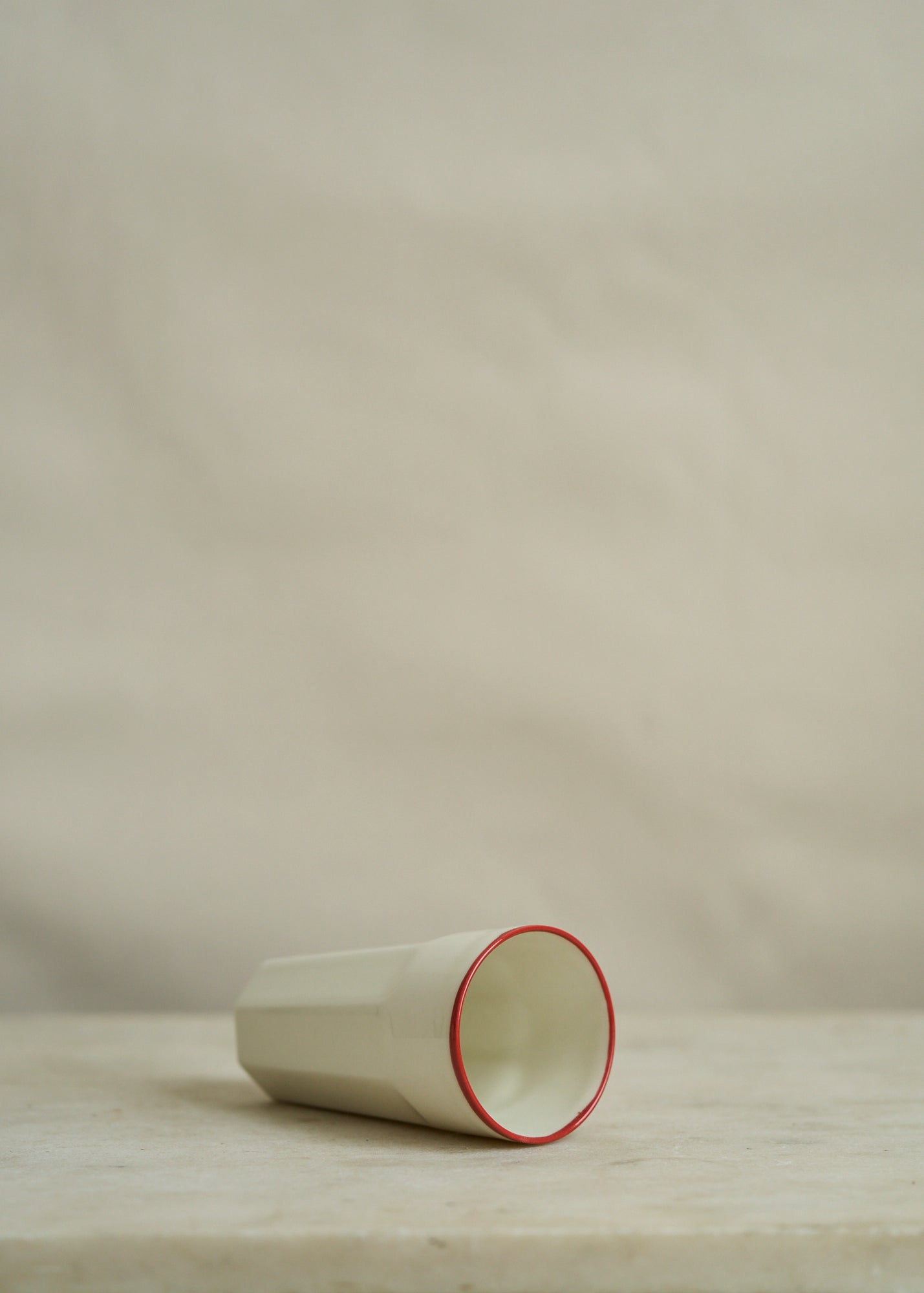 Porcelain Drinking Mug with Red Rim