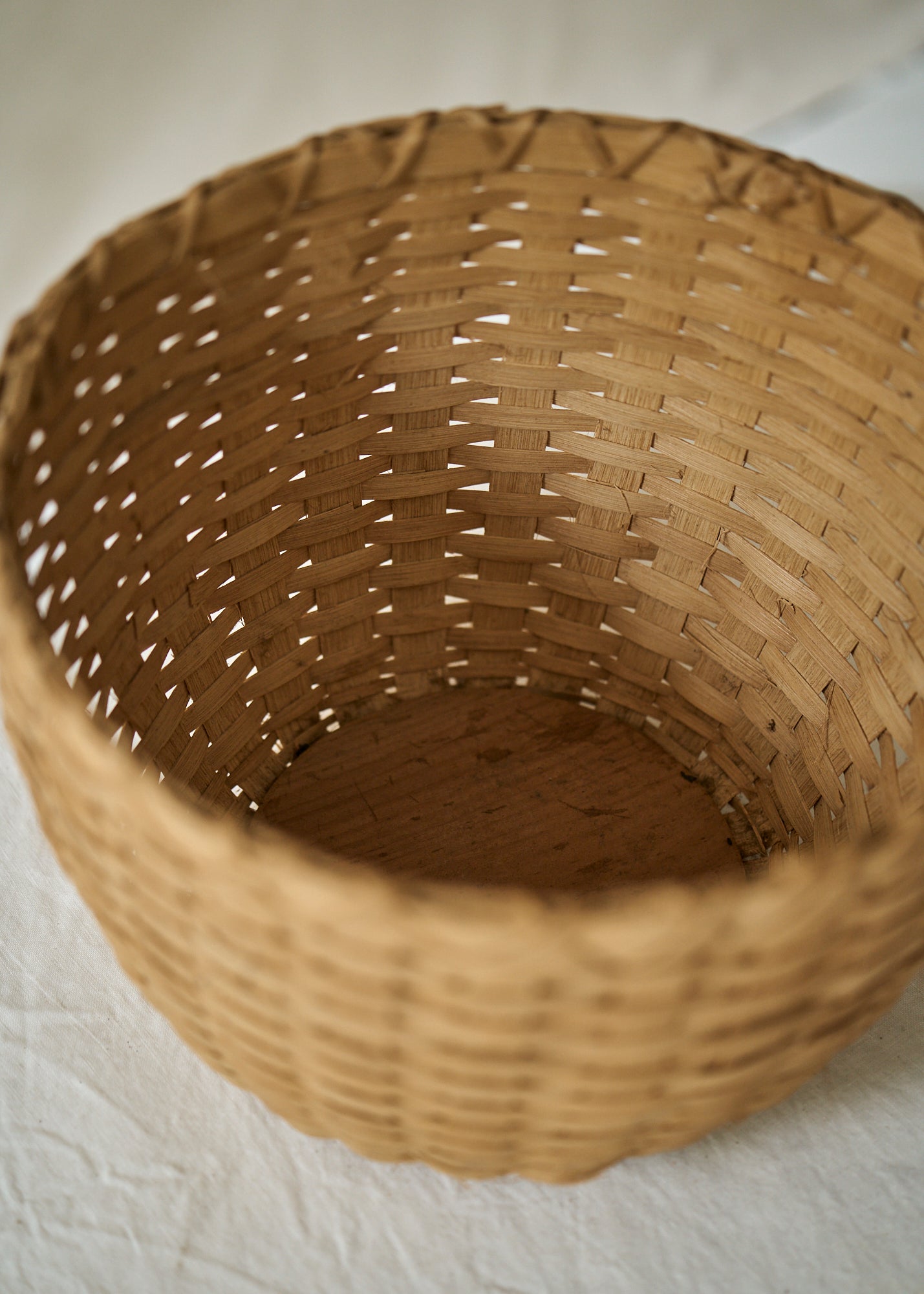 Antique Handwoven Basket with Wood Base