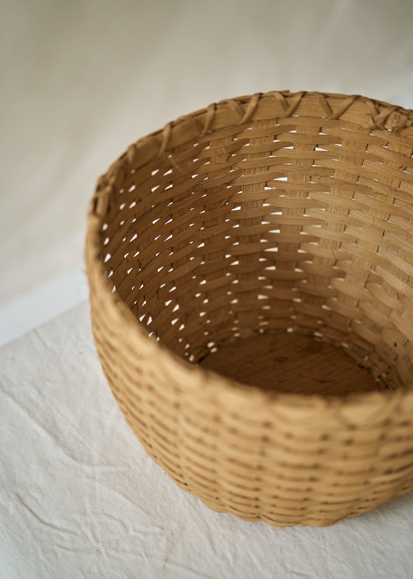 Antique Handwoven Basket with Wood Base